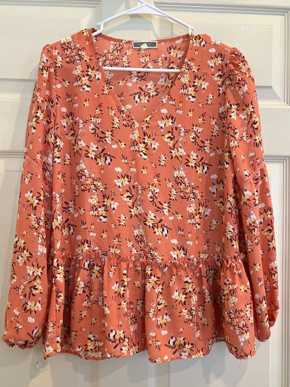 PLEION Coral Floral Peplum Top